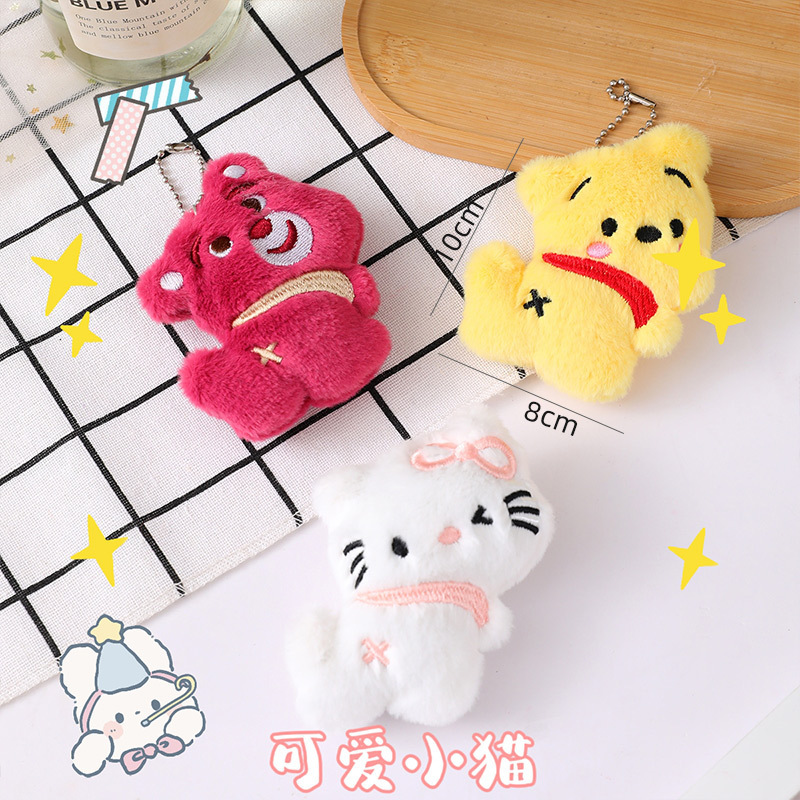 Caricatura peluche fresas oso broche lindo perro Pacha muñeca bolsas de muñecas colgar DIY accesorios de ropa al por mayor