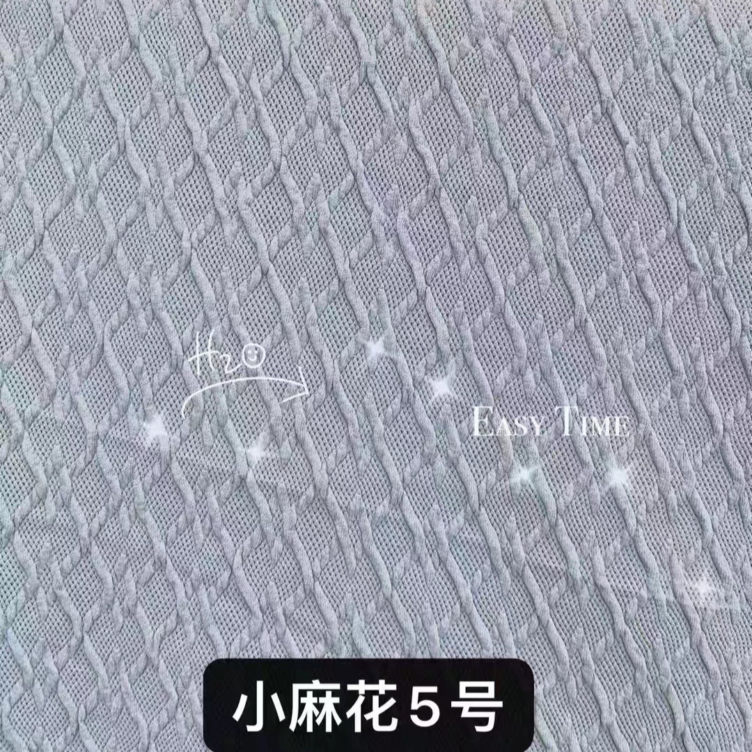 现货供应秋冬家居服抗起球麻花针织面料 柔软弹力提花面料