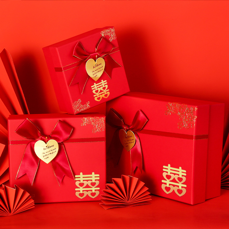 Spot rojo arco caja de dulces de boda compañero de boda caja de regalo de mano cubierta de cielo y tierra caja festiva caja de regalo exquisita al por mayor