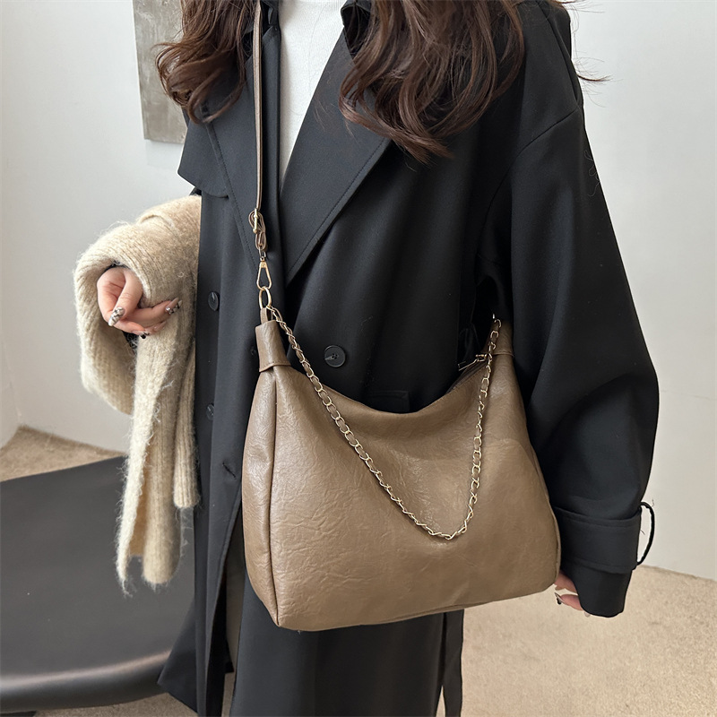 2024 bolso de estudiantes coreano para mujeres de gran capacidad nicho versátil bolso de hombro de alto nivel bolso de cubo de cadena