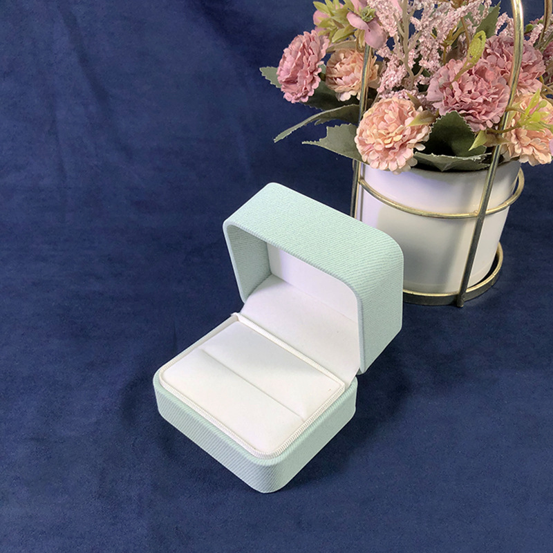 Cubierta de ángulo redondeado fresco caja de joyería de cuero PU caja de embalaje de joyería de moda anillo brazalete embalaje de joyería