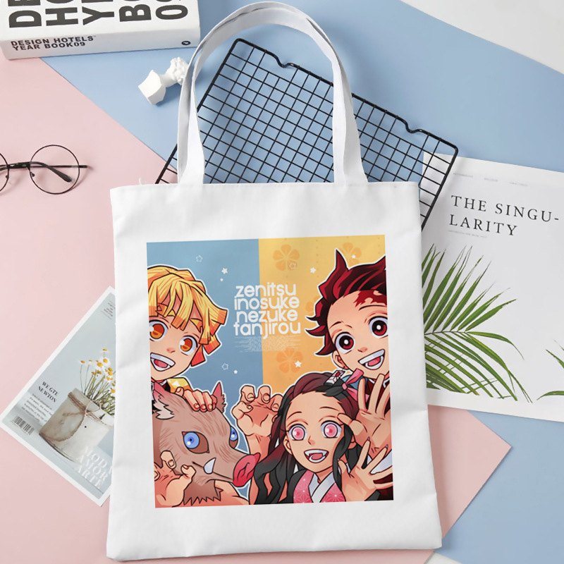 Comercio exterior transfronterizo Demon Slayer impresa bolsa de lona Harjuku bolsa de hombro bolsa de compras portátil de moda para estudiantes