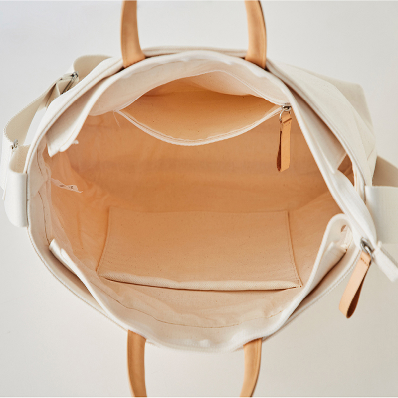 Bolso de mano de punto nuevo bolso de lona de rayas de las mujeres nicho de moda simple hombro mensajero Bolsa De fábrica al por mayor