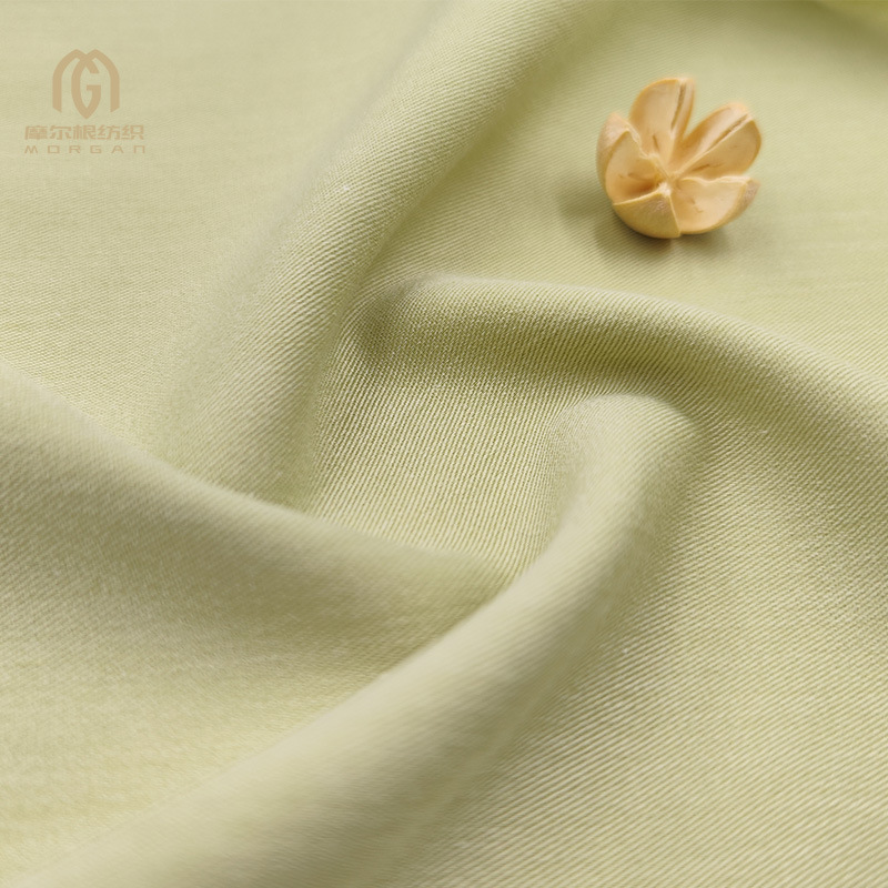 Tela Guangzhou TR poliéster algodón fino oblicuo llano primavera y otoño traje uniforme camisa pantalones de herramientas tela de rayón