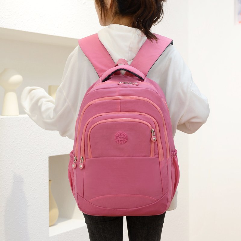 Nueva mochila transfronteriza tendencia de bolsas escolares de estudiantes de secundaria bolsas de nylon de gran capacidad mochila mono colgante