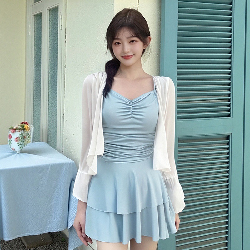 Nuevo traje de baño femenino de una pieza de color sólido cabestrillo niña dulce que cubre la carne y se ve delgado traje de baño de vacaciones de aguas termales de playa al por mayor