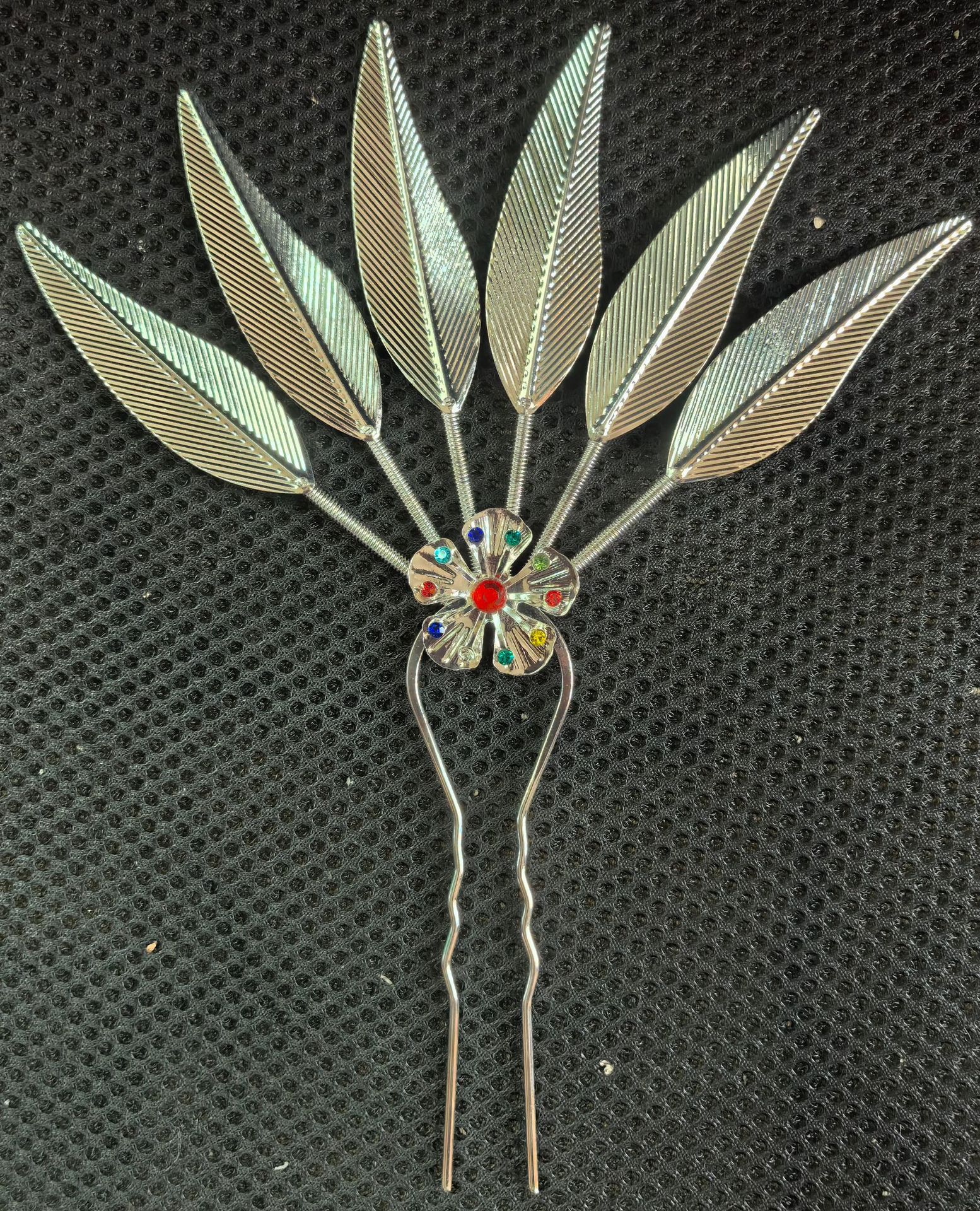 diamante de color plateado