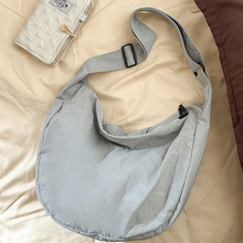 日系大容量斜挎包女休闲百搭帆布包复古慵懒风饺子包尼龙布单肩包