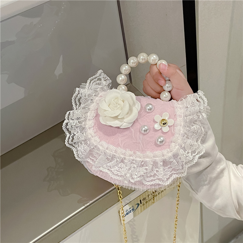 2022 nuevas niñas bolso de perlas de dibujos animados lindo arco princesa bolso de hombro estilo occidental encaje pequeño bolso de hombro