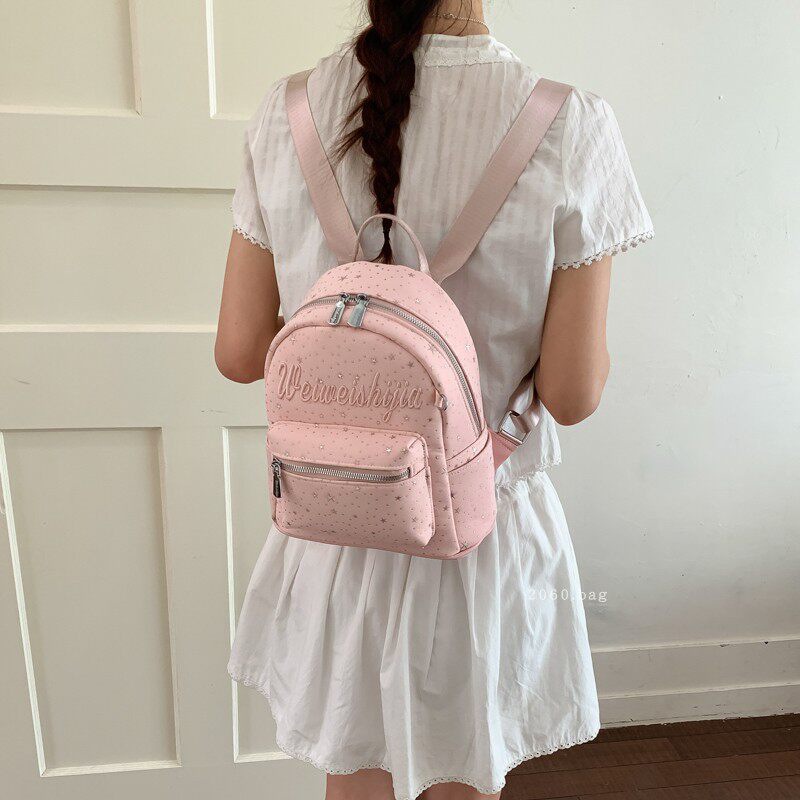 Mochila de moda mochila 2026 mochila de gran capacidad para estudiantes universitarios en clase nueva primavera bolsa de letras lienzo para mujeres