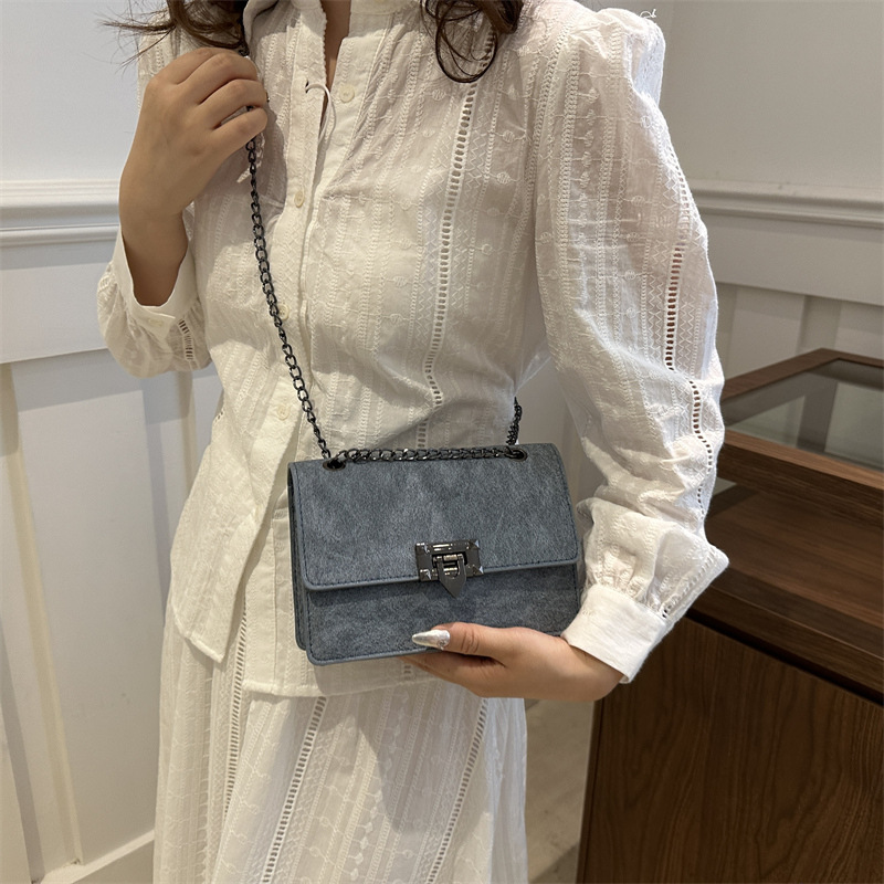 Bolsa de mochila de textura retro para mujeres 2024 nueva cadena coreana bolso cuadrado red rojo aire de viaje bolsa de hombro de moda