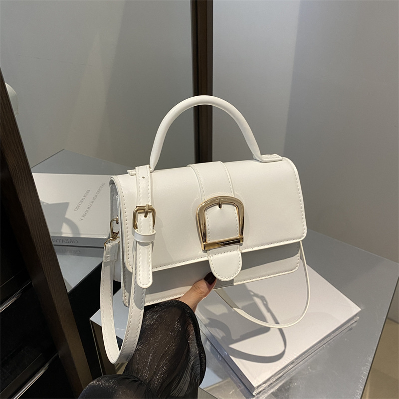 Bolsos de celebridades de Internet 2024 nuevo bolso de mujer de un solo hombro de mano de moda de primavera, bolso cuadrado pequeño de todo fósforo de mensajero de estilo occidental de alta gama