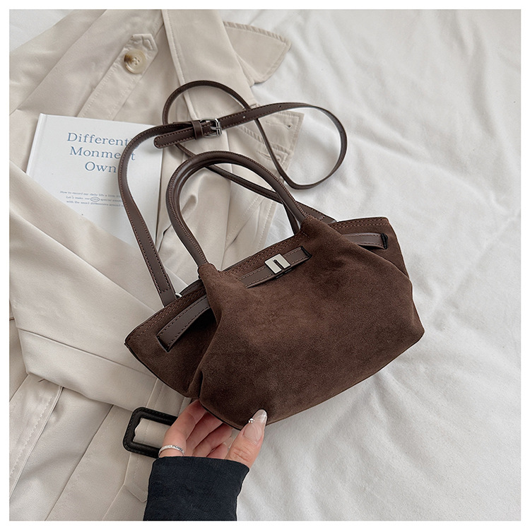 Cestas de platos de mano bolsas de cubo mujeres 2025 nuevo cross-border europeo y americano retro mochila de piel de ciervo esmaltado