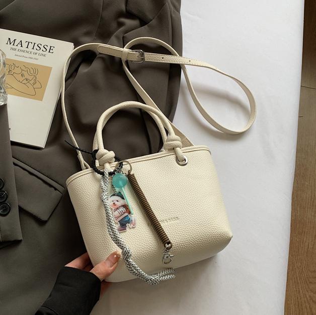 Bolso de cubo portátil para mujer, nuevo bolso de mensajero de textura salvaje 2025, bolso de canasta de verduras de moda retro de alta gama