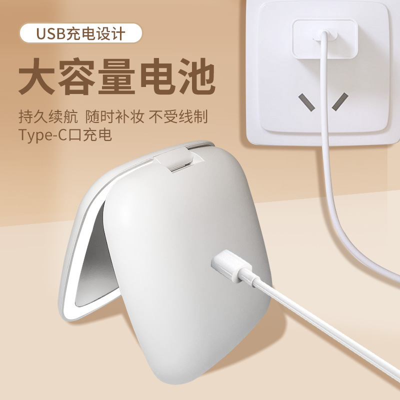 Diseño de fábrica regalo pequeño espejo Amazon LED espejo de maquillaje con luz Flip portátil de mano pequeño espejo logo