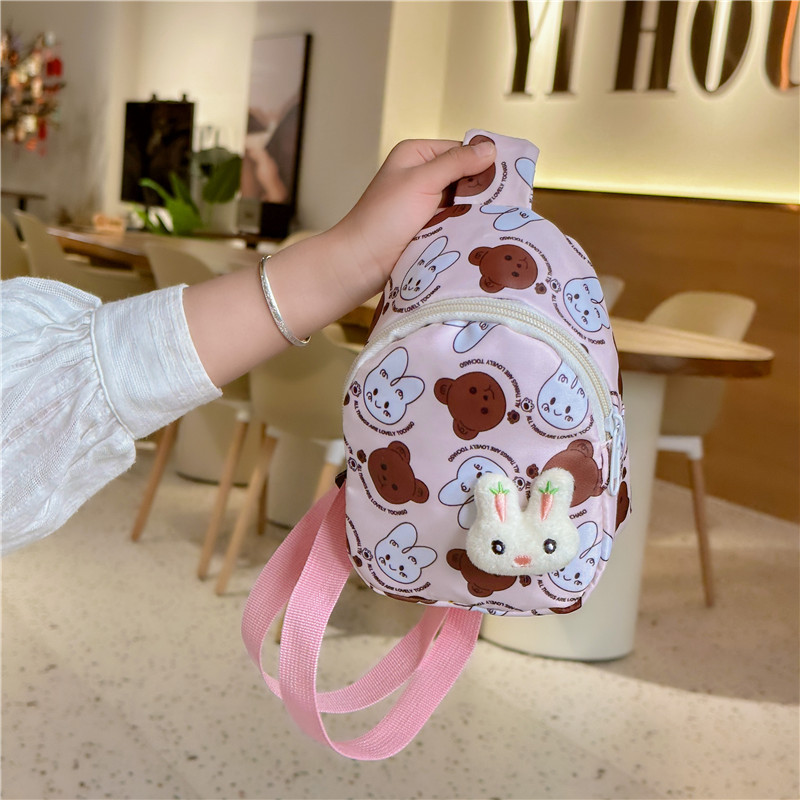 2023 nuevos niños mochila de dibujos animados de graffiti bolsa casual Super lindo fuera pequeño pecho bolsa lindo conejo bolsa