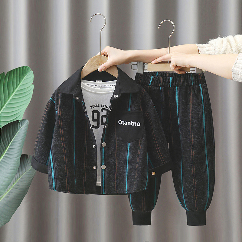 7607 Traje negro para niños 2025 nueva ropa de mezclilla estampada de moda de primavera y otoño para niños