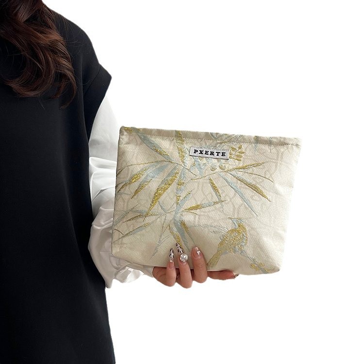Bolsa de maquillaje de mariposa transfronteriza pequeña bolsa fresca portátil de cuidado de la piel bolsa de almacenamiento bolsa de lavado de viaje bolsa de lona bolsa de mano