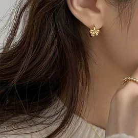 蝴蝶结耳环怎么选？复古泰银风女士耳饰选购指南