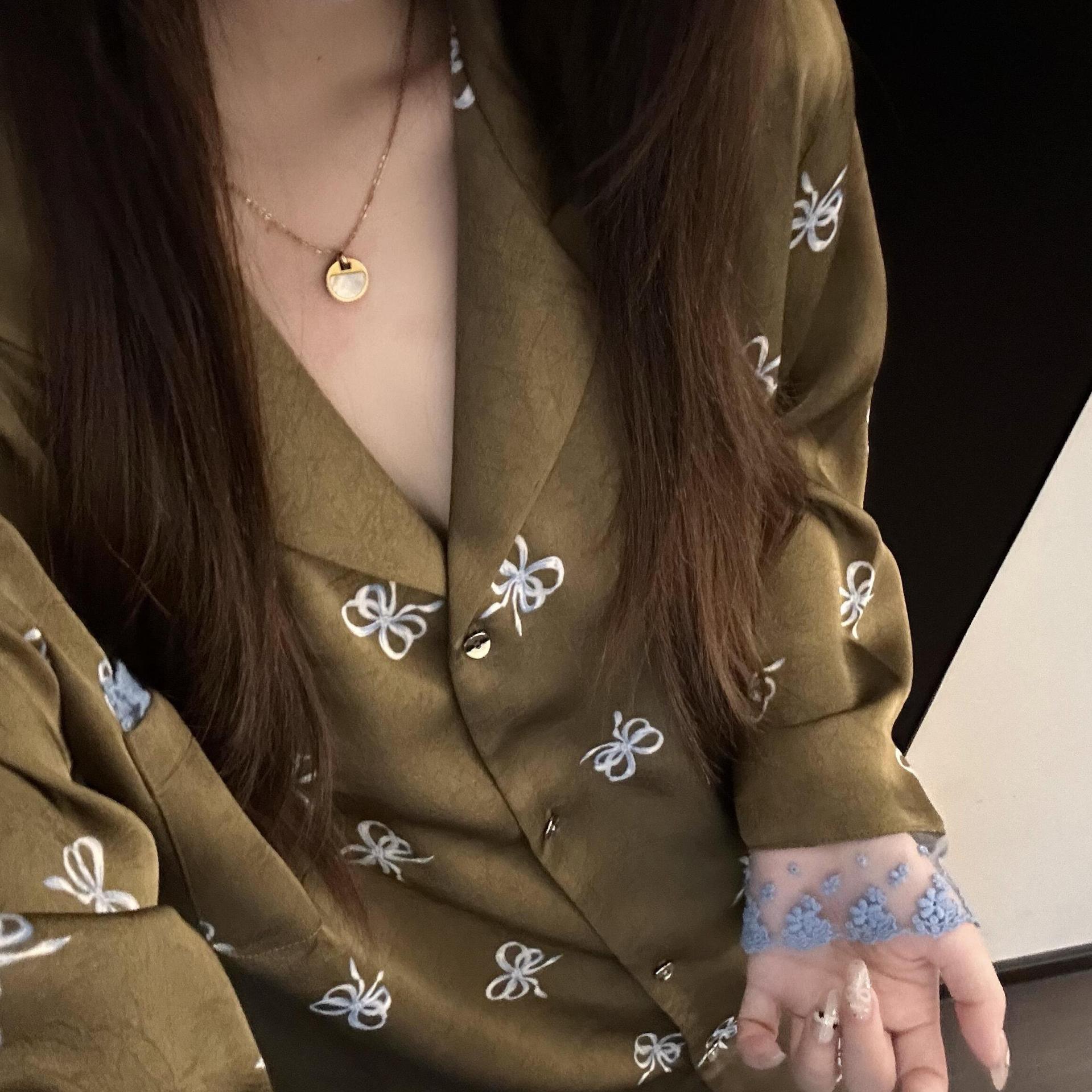 韓国スタイルのハイエンドリボンプリントアイスシルクパジャマ女性のための 2025 夏カジュアル大きいサイズスーツアウターホーム服