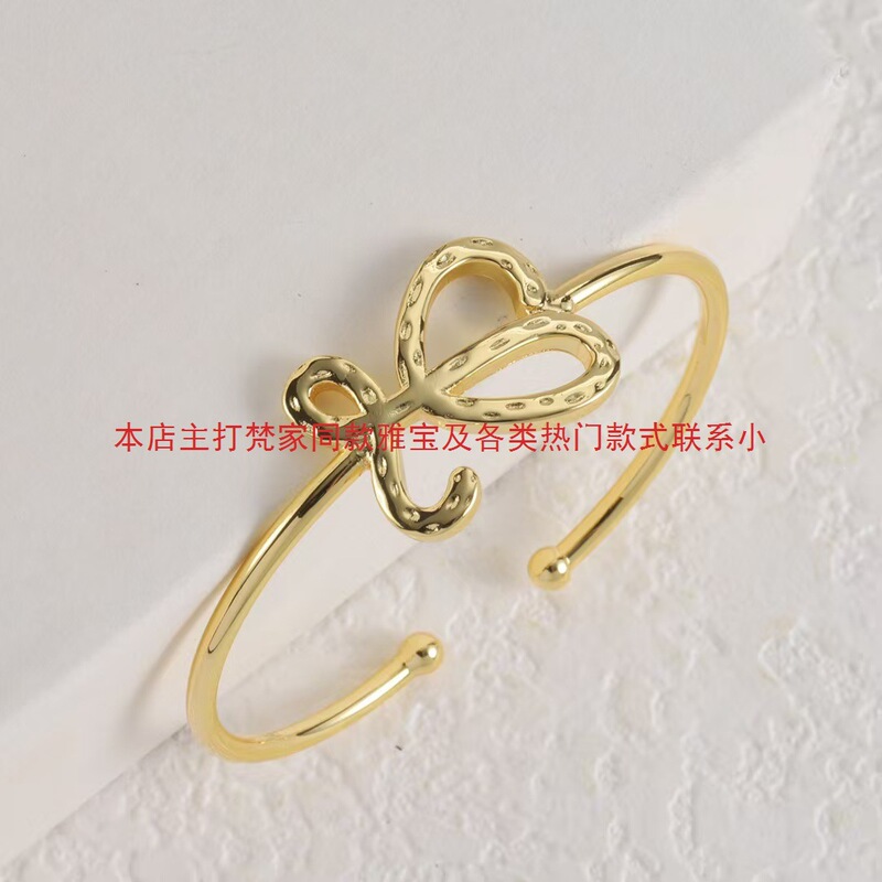 Cross-Border Exclusive Supply of Luo Jia Heart-Shaped Hollow Metal 18K Gold-Plated Open Bracelet, Fashionable and Simple Designer Bracelet Cross-Border Exclusive Supply of Luo Jia Heart-Shaped Hollow Metal 18K Gold-Plated Open Bracelet, Fashionable and Simple Designer Bracelet