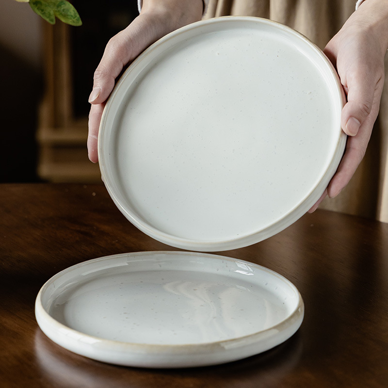 Diseño de plato de cerámica crimpado plato de espagueti plato de cubierta de color sólido al por mayor plato redondo casero plato de platos poco profundos