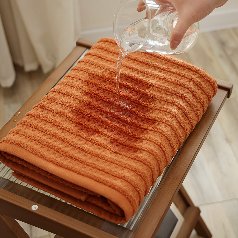 Toalla de algodón al por mayor toalla de baño que no es fácil de perder el cabello 2025 nuevo estilo liso, toalla de tira suave, toalla facial