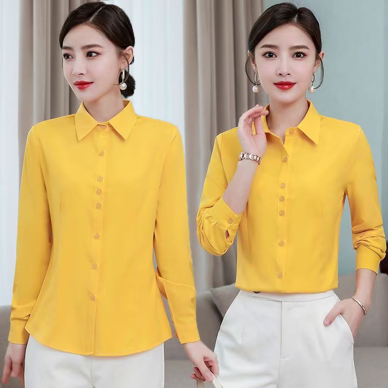 新しいチベットの青いシャツの女性の長袖の修身の職業の服装の大きいサイズの工装の作業服の韓国版のファッションはシャツを打ちます。