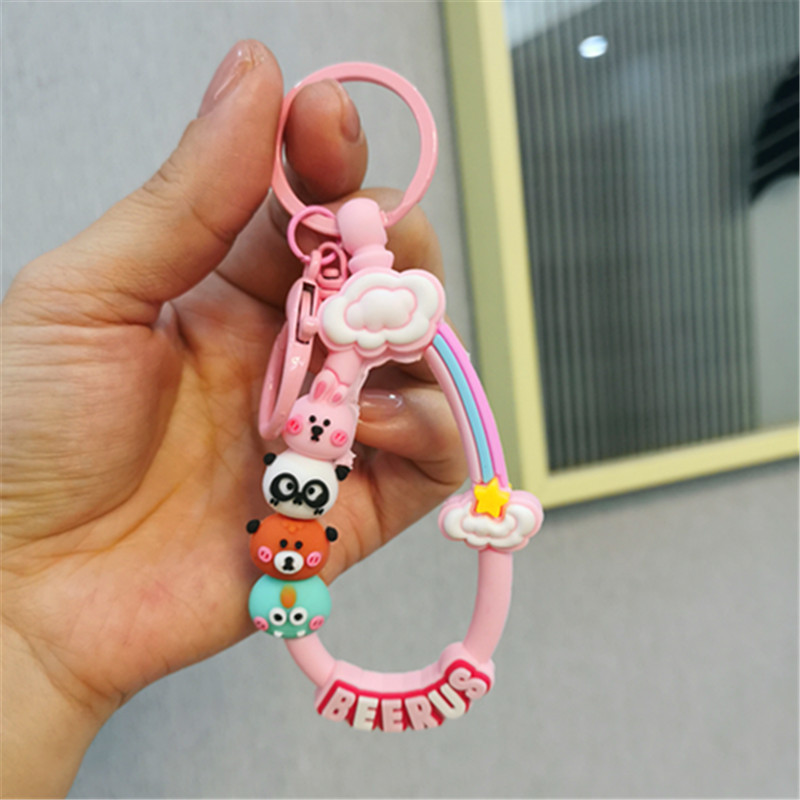 Colorido Berus dibujos animados cuerda Rana conejo llavero colgante Cadena de teléfono móvil fresco color sólido conjunto auriculares