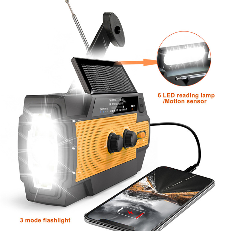 Radio de emergencia al aire libre de emergencia de prevención de desastres manual linterna multifuncional de Amazon carga solar eléctrica
