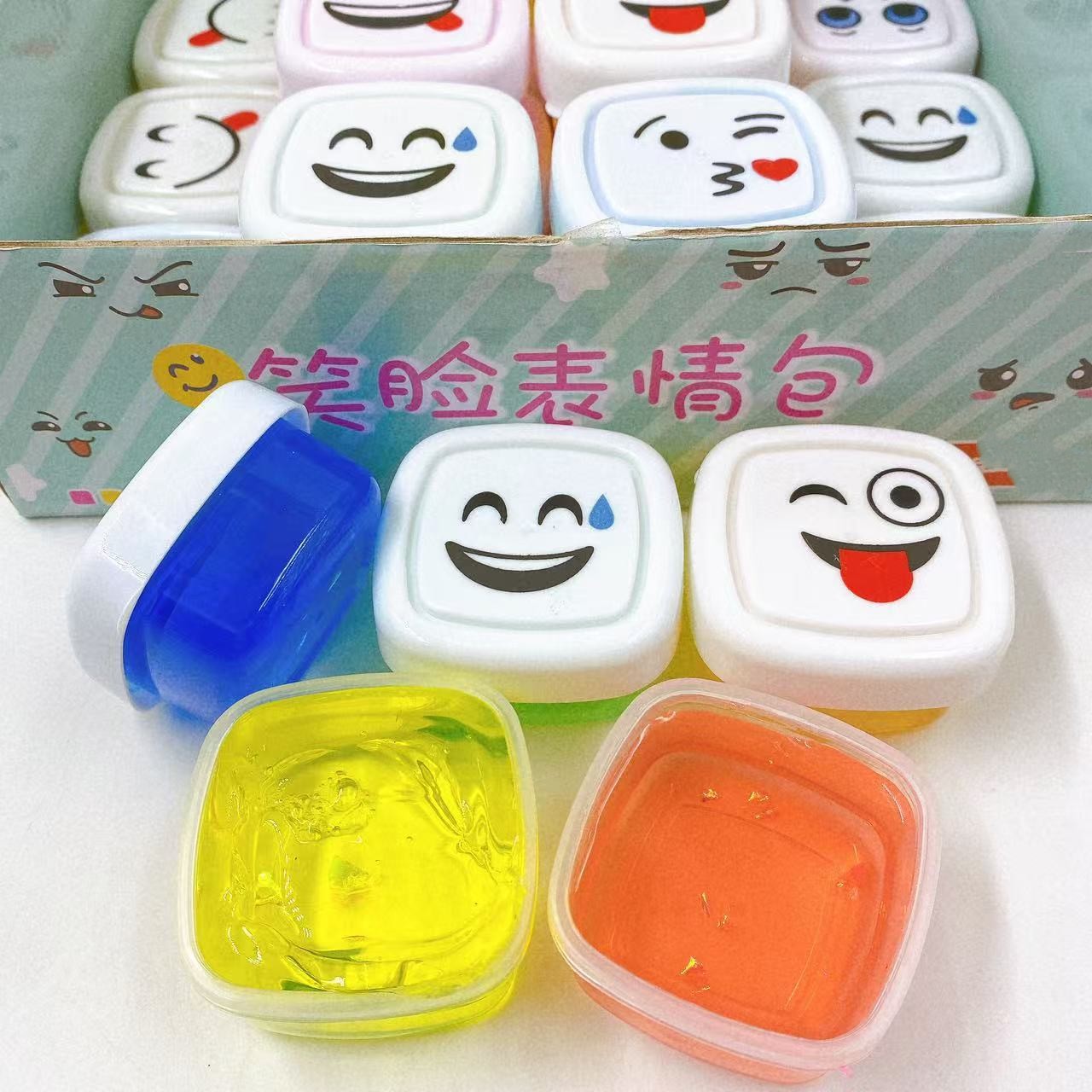 Nuevo 24 en la cara sonriente emoji bolsa goma espumante slime barro colorido para niños barro de cristal juguetes al por mayor