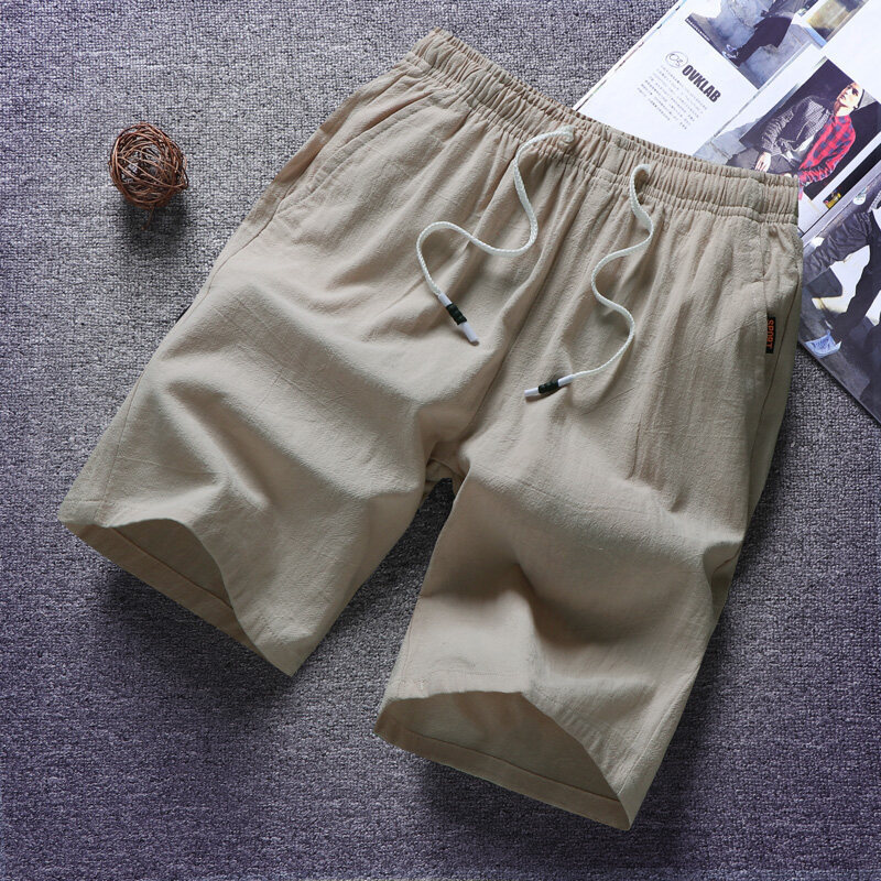 Pantalones cortos de algodón de verano tendencia masculina coreana sueltos pantalones casuales de algodón 5 pantalones de playa