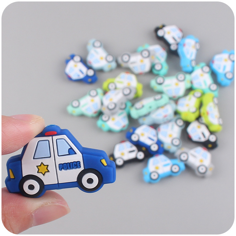 Bebé suministros de dibujos animados coche de silicona policía coche mordedor creativo DIY bebé molar pezón anti-gota cadena Accesorios