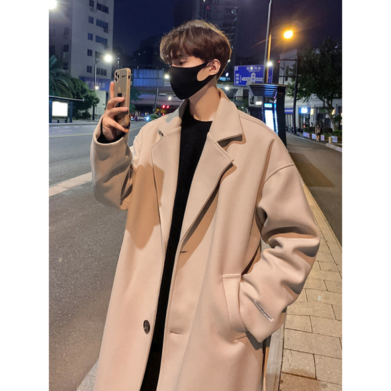 韓国版百合の中長のウインドブレーカーの男性の秋冬のタイプは膝の英倫の風毛のコートを過ぎてゆったりとしています。