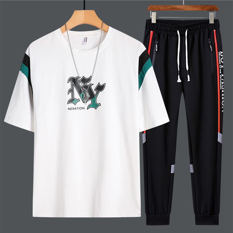 Set de mangas cortas para hombres de verano nuevo estilo de moda adolescente camiseta suelta con pantalones deportivos de tendencia casual de dos piezas