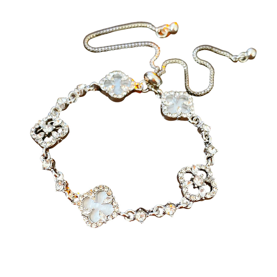 Zircón ultra brillante flor de diamante hueco pulsera ligera lujo de alto nivel sensación de diseño de pulsera delicada sensación de nicho al por mayor