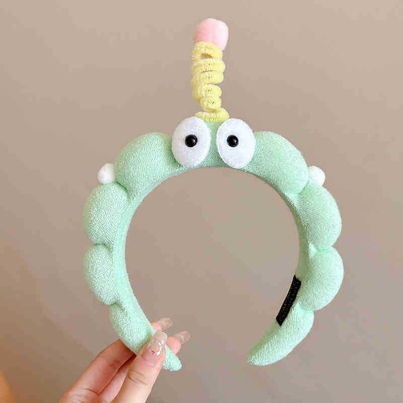 Bonito y divertido barra de torsión, banda de cabello para niños con ojos grandes, tocado de cabello para mujeres, clip de cabello para el cabello de alta cabeza antideslizante para lavar la cara.