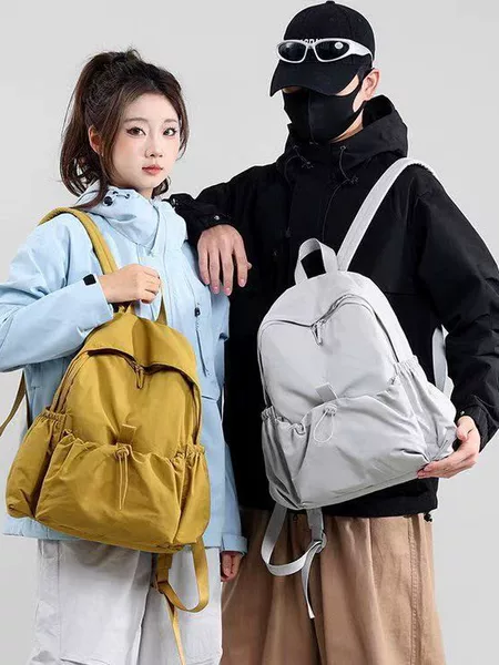 Cross-border best-selling Korean-style casual large-capacity student backpack for men and women, 2026 new lightweight outdoor sports and hiking model