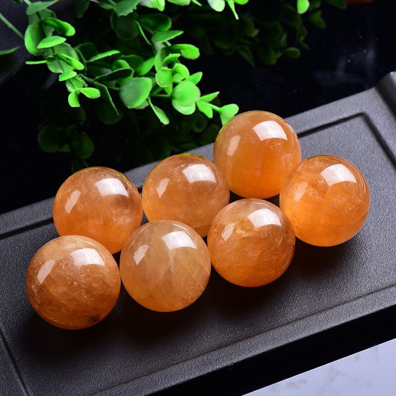 Natural Huangbingzhou Ball Ornaments Natural Raw Stone Polished Huangbingzhou Ball Seven Star Array calcite crystal craft ornaments