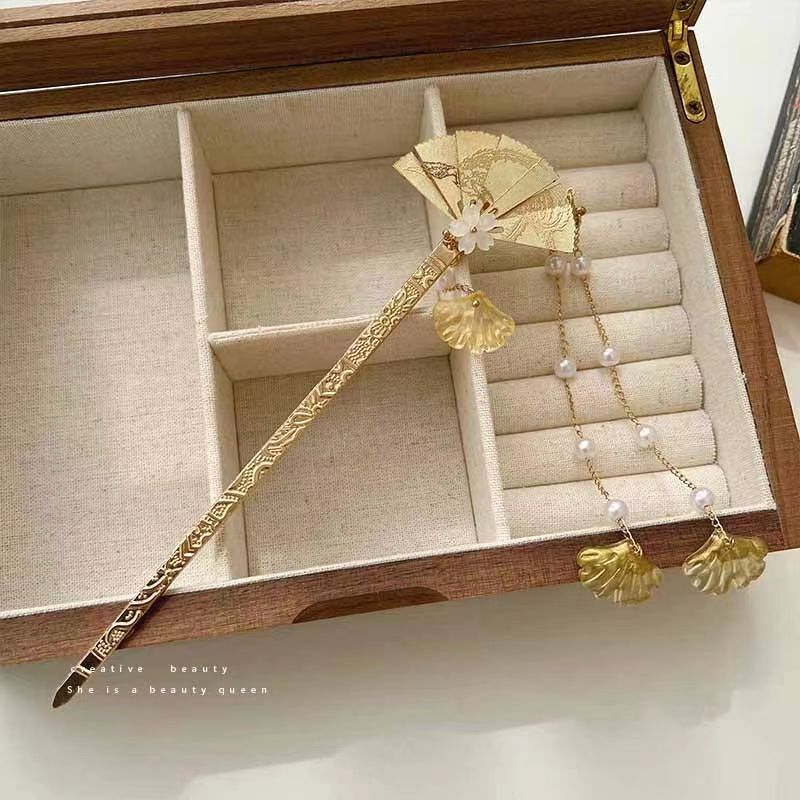 Abanico paso a paso horquilla de borla de perlas de alto valor estilo antiguo de alta calidad horquilla nuevo estilo chino frío y largo accesorios para el cabello con borla