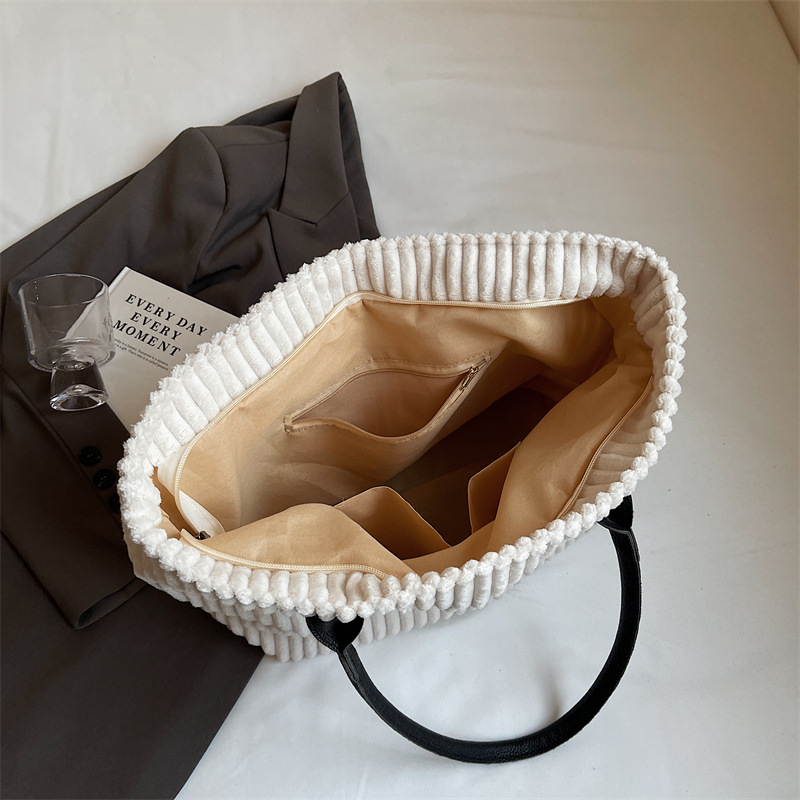 Bolso de terciopelo a rayas de gran capacidad para mujer 2024 otoño e invierno nuevo bolso de compras de un solo hombro de todo fósforo bolso de viaje de clase de todo fósforo