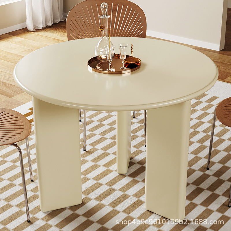 Mesa de comedor redonda nórdica muy simple y moderna comedor casero famoso en línea pequeño estilo de casa crema sensación de atmósfera mesa casual
