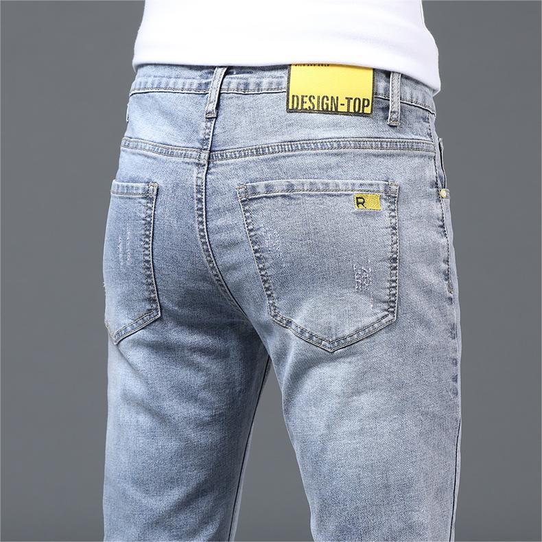 Jeans homme slim fit petits pieds 2024 printemps et automne style fin tendance polyvalent élastique lavé décontracté jambe droite longue_voghion.com