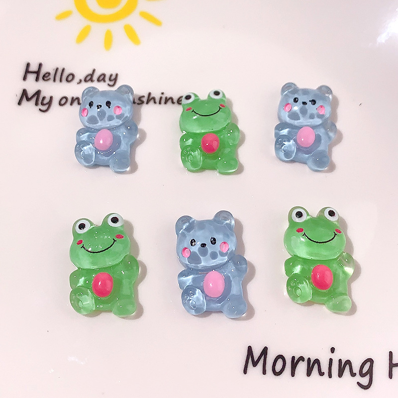 Accesorios de resina de rana de explosión DiDi dibujos animados transparentes animales abrazadera de cabello agujero de cuerda agujero de botón de zapato material de parche de caso de teléfono móvil