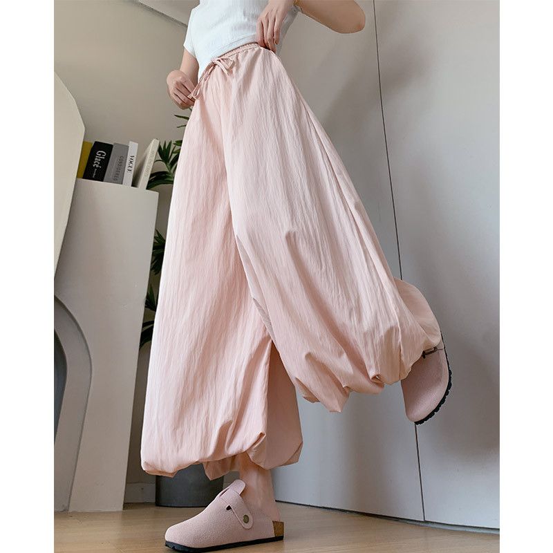 Pantalones de falda de capullo de flor de seda de hielo para mujer estilo fino de verano 2025 nuevo estilo casual perezoso pantalones de pierna ancha pequeños bombachos amarillos