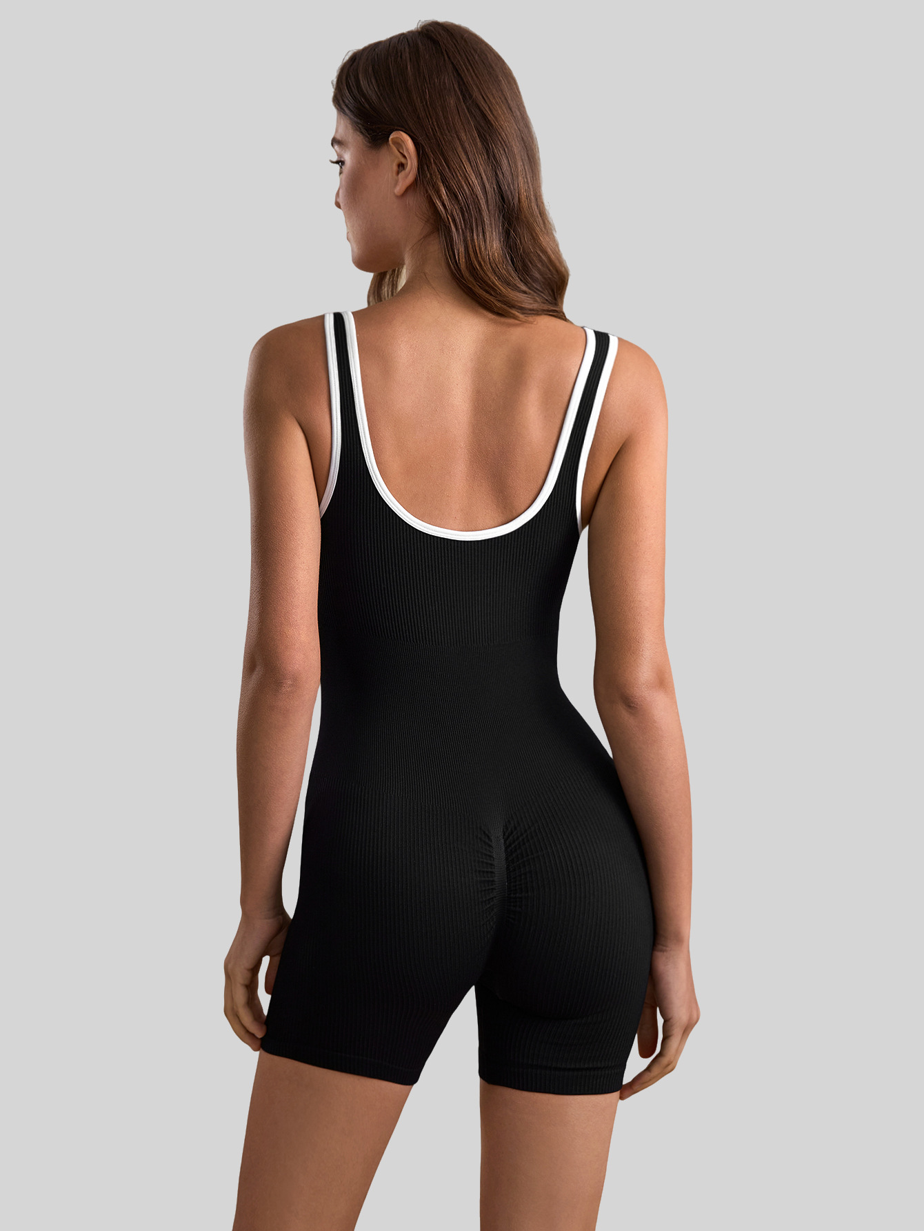 Ropa de yoga de una pieza de color de contraste con cuello en V para primavera y verano