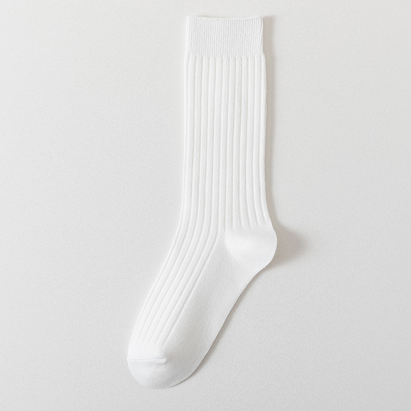 Calcetines de mujer de color sólido calcetines de media pantorrilla de primavera y otoño calcetines de pila de color caramelo de algodón peinado de mujer Zhuji calcetines largos de mujer al por mayor