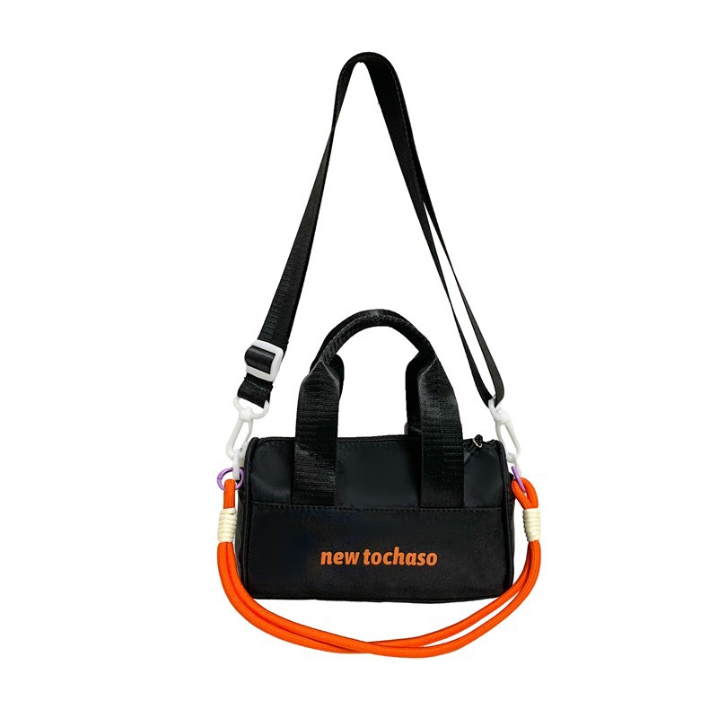 Bolsa de hombro casuales coreana para niños y niñas, letras extranjeras para bebés, bolsas portátiles de balde de agua 2025, nuevas bolsas de comercio exterior para niños