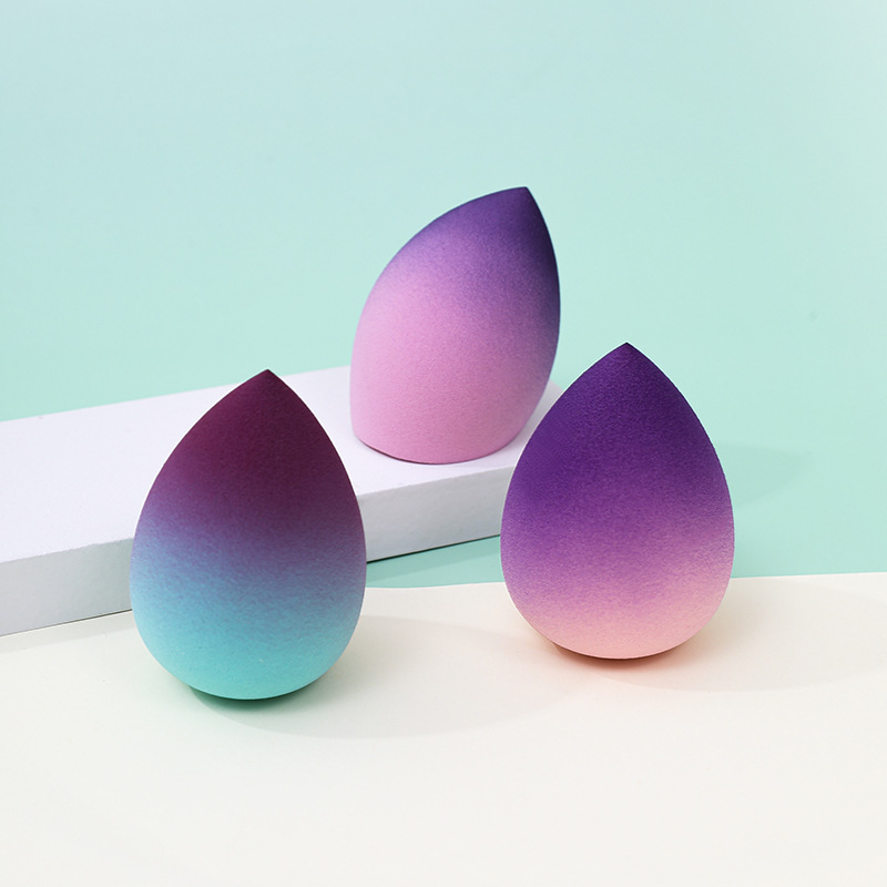 Huevo de belleza de color degradado, soplo de polvo, poliuretano transfronterizo, gotas de agua, esponja de maquillaje, maquillaje, fábrica de huevos, venta al por mayor personalizada