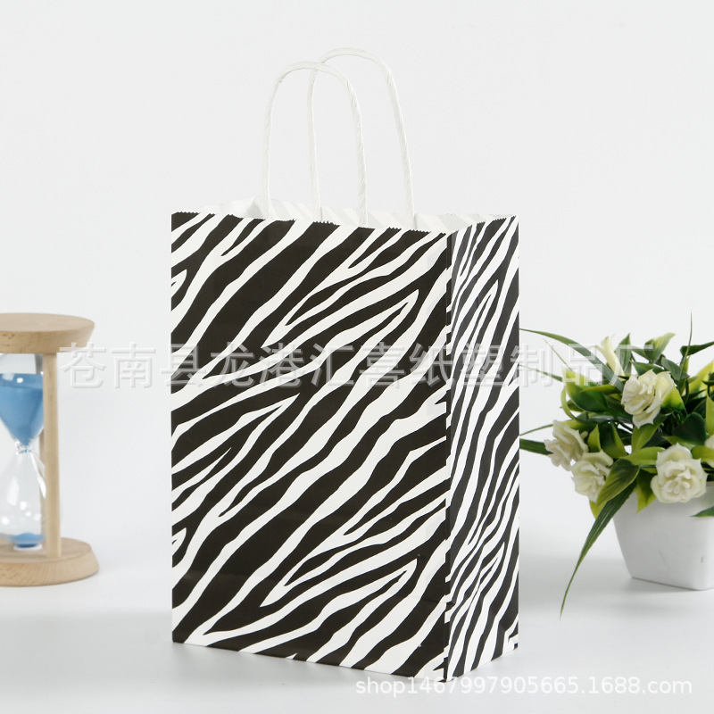 Amazon transfronterizo leopardo impresión serie moda bolsa de papel bolsa de regalo Portátil Bolsa de regalo exquisita bolsa de regalo en stock